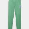 Vintage Supply JOGGER WITH SHEILD LOGO EMBROIDERY UNISEX - Tracksuit Bottoms - Green